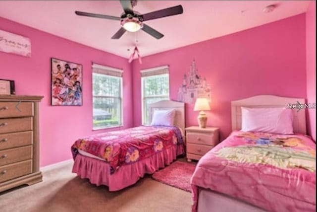 214 Tupelo Cir, Davenport, FL 33897 - carpeted bedroom featuring baseboards and a ceiling fan