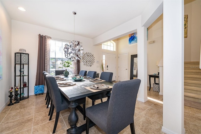 389 Yellow Snapdragon Dr, Davenport, FL 33837 - dining area with a chandelier and baseboards