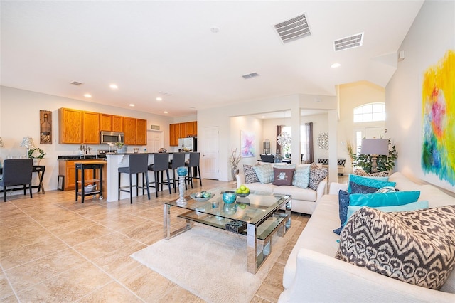 389 Yellow Snapdragon Dr, Davenport, FL 33837 - living area with recessed lighting and light tile patterned flooring