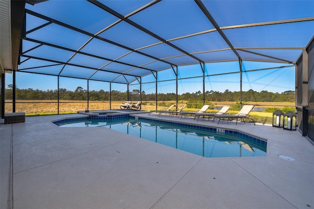 389 Yellow Snapdragon Dr, Davenport, FL 33837 - view of pool featuring a patio area, a pool with connected hot tub, a lanai, and view of wooded area