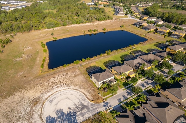 389 Yellow Snapdragon Dr, Davenport, FL 33837 - aerial perspective of suburban area with a nearby body of water