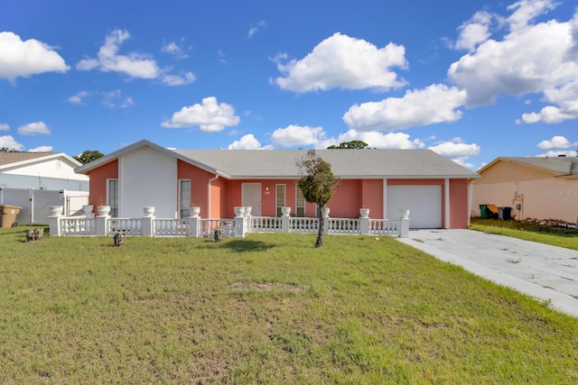 572 Floral Dr, Kissimmee, FL 34743 - view of front facade featuring a garage, concrete driveway, and stucco siding