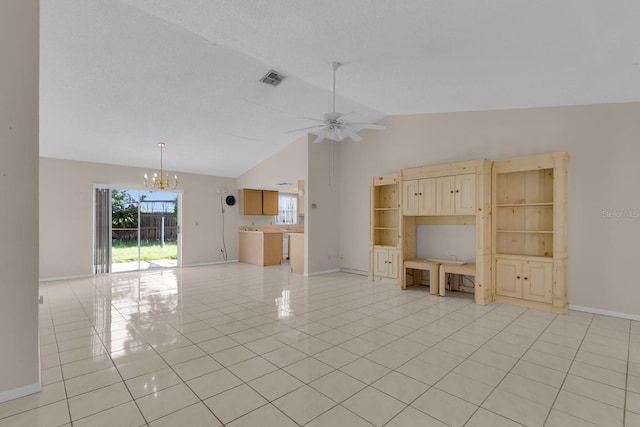 572 Floral Dr, Kissimmee, FL 34743 - unfurnished living room featuring light tile patterned floors, vaulted ceiling, a chandelier, ceiling fan, and baseboards