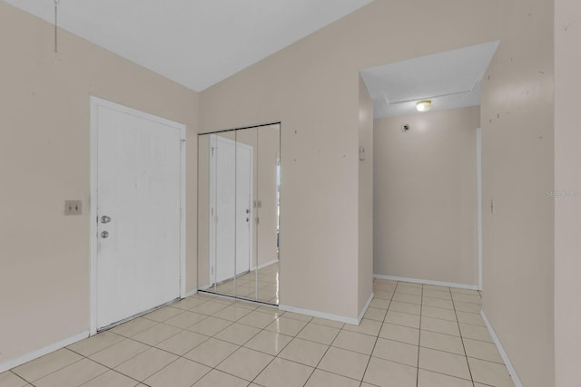 572 Floral Dr, Kissimmee, FL 34743 - foyer featuring baseboards and light tile patterned floors