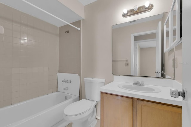 572 Floral Dr, Kissimmee, FL 34743 - full bath featuring vanity, toilet, and bathing tub / shower combination