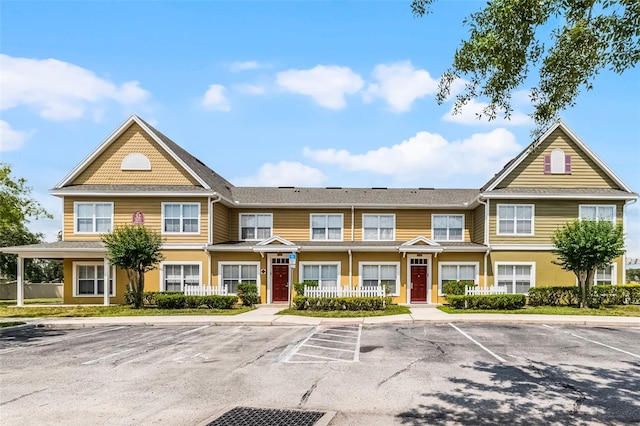 4551 Jonafree Ln Unit 103, Kissimmee, FL 34746 - view of front of house with uncovered parking