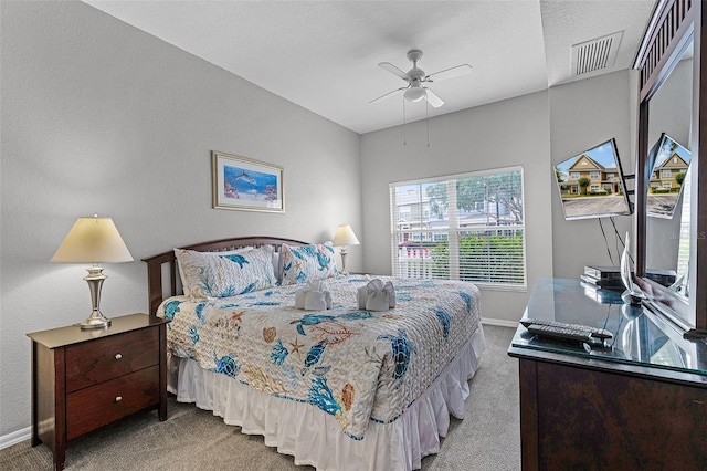 4551 Jonafree Ln Unit 103, Kissimmee, FL 34746 - carpeted bedroom featuring baseboards and a ceiling fan