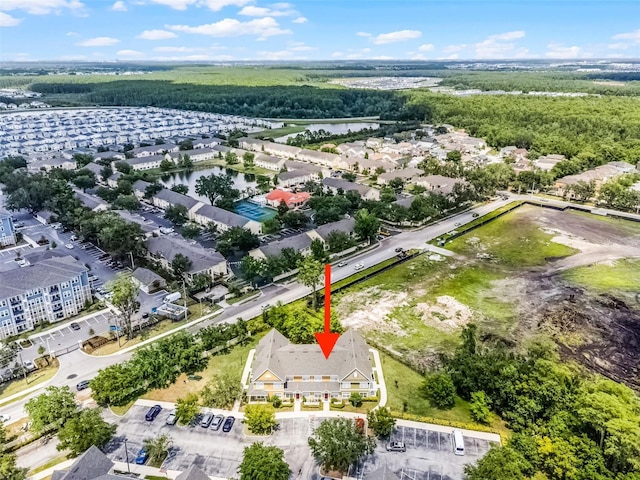 4551 Jonafree Ln Unit 103, Kissimmee, FL 34746 - drone / aerial view of a large body of water and a heavily wooded area