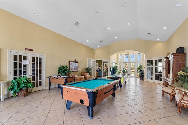 4551 Jonafree Ln Unit 103, Kissimmee, FL 34746 - rec room featuring french doors, high vaulted ceiling, arched walkways, light tile patterned floors, and billiards