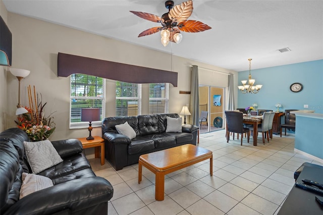 3015 Yellow Lantana Ln, Kissimmee, FL 34747 - living room with a chandelier, a ceiling fan, and light tile patterned flooring