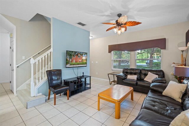 3015 Yellow Lantana Ln, Kissimmee, FL 34747 - living area featuring a ceiling fan, stairs, and light tile patterned floors