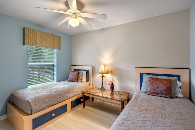 3015 Yellow Lantana Ln, Kissimmee, FL 34747 - bedroom with wood finished floors and a ceiling fan