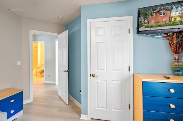 3015 Yellow Lantana Ln, Kissimmee, FL 34747 - bedroom with light wood-type flooring and baseboards