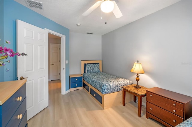 3015 Yellow Lantana Ln, Kissimmee, FL 34747 - bedroom featuring light wood-style flooring and ceiling fan