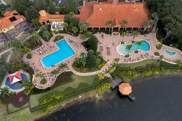 3015 Yellow Lantana Ln, Kissimmee, FL 34747 - aerial overview of property's location featuring a pool area and a nearby body of water