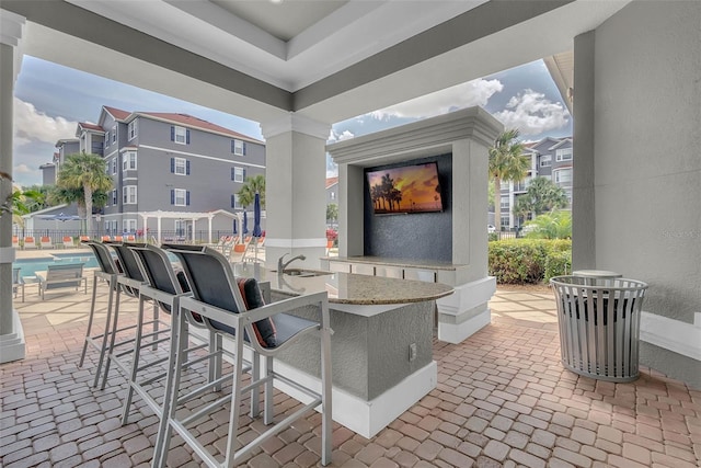 3015 Yellow Lantana Ln, Kissimmee, FL 34747 - view of patio / terrace with a community pool