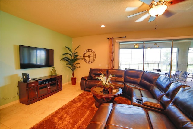 2147 Tripoli Ct, Kissimmee, FL 34747 - living room with light tile patterned flooring, baseboards, recessed lighting, ceiling fan, and a textured ceiling