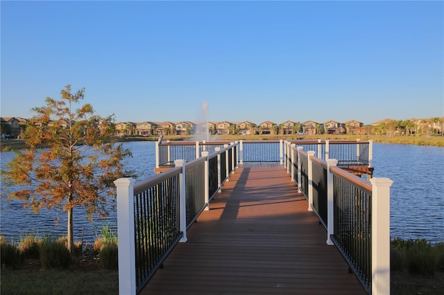 2147 Tripoli Ct, Kissimmee, FL 34747 - dock featuring a residential view and a water view