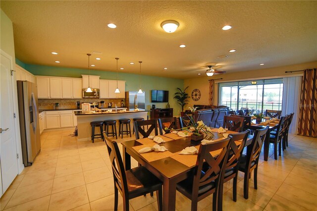 2147 Tripoli Ct, Kissimmee, FL 34747 - dining space with light tile patterned floors, recessed lighting, a textured ceiling, and ceiling fan