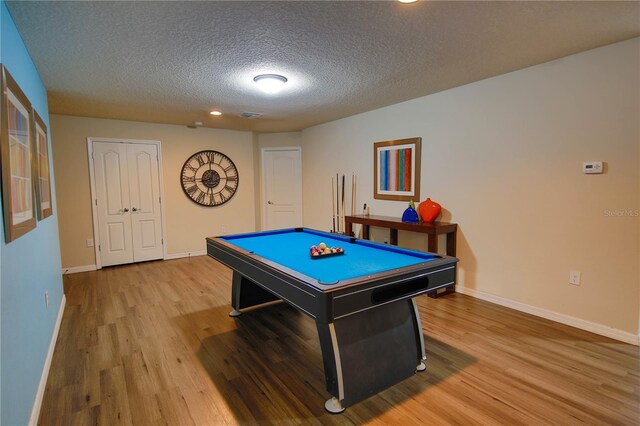 2147 Tripoli Ct, Kissimmee, FL 34747 - rec room with wood finished floors, a textured ceiling, baseboards, pool table, and recessed lighting
