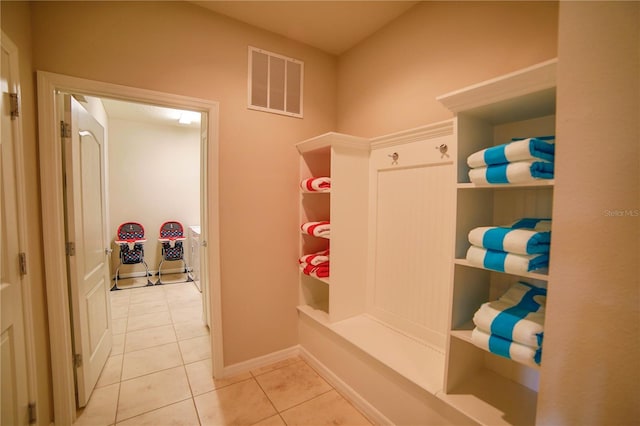 2147 Tripoli Ct, Kissimmee, FL 34747 - mudroom with tile patterned floors and baseboards