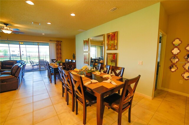 2147 Tripoli Ct, Kissimmee, FL 34747 - dining space with light tile patterned flooring, recessed lighting, a textured ceiling, ceiling fan, and baseboards