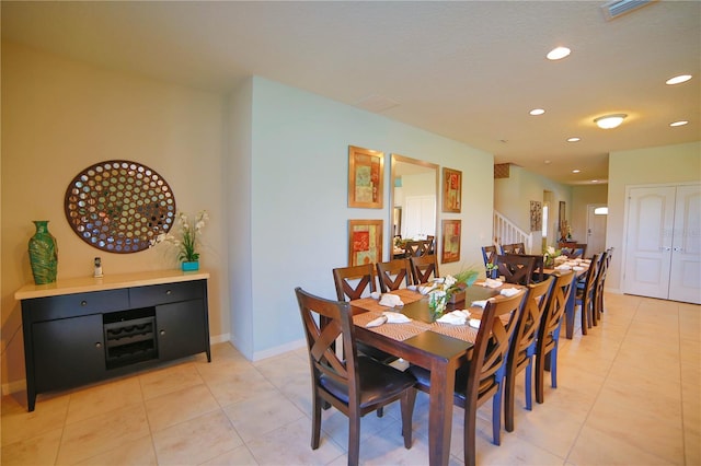 2147 Tripoli Ct, Kissimmee, FL 34747 - dining space with recessed lighting, stairs, light tile patterned floors, and baseboards