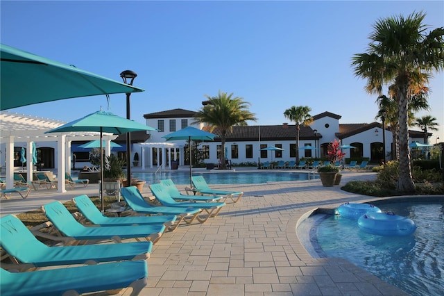 2147 Tripoli Ct, Kissimmee, FL 34747 - community pool featuring a patio and a pergola
