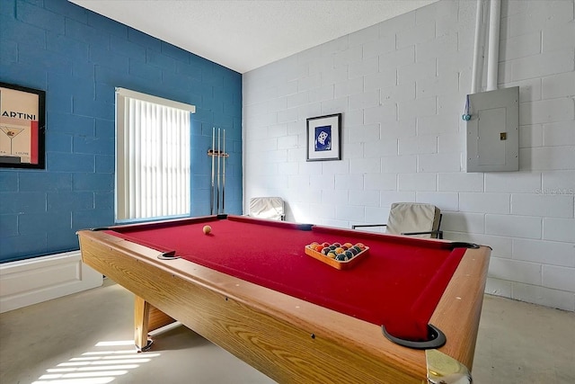 553 Bailey Cir, Davenport, FL 33897 - game room with electric panel, concrete floors, billiards, and concrete block wall