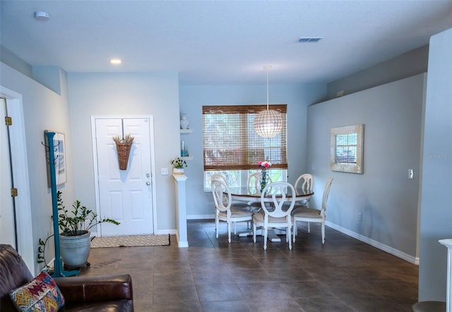 2341 Stone Cross Cir, Orlando, FL 32828 - dining area featuring baseboards, recessed lighting, and tile patterned floors
