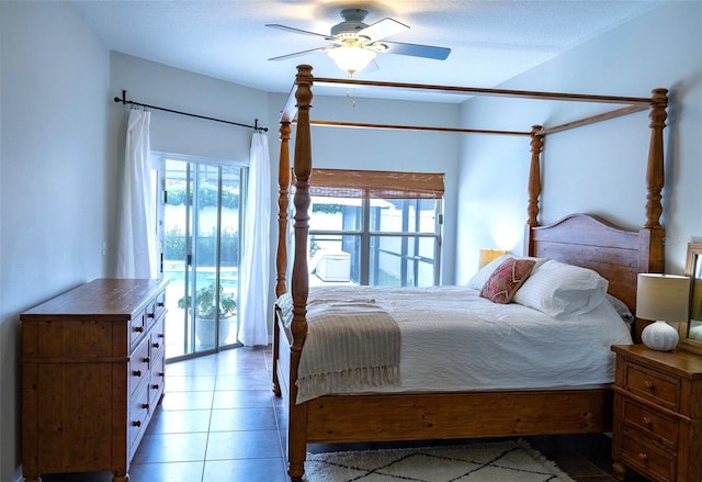 2341 Stone Cross Cir, Orlando, FL 32828 - bedroom with light tile patterned floors, a ceiling fan, and access to outside