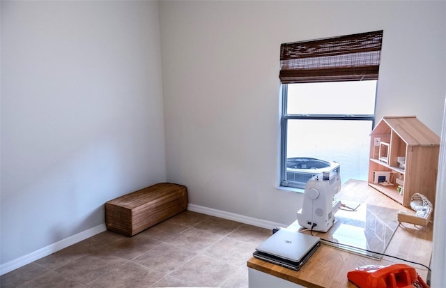 2341 Stone Cross Cir, Orlando, FL 32828 - office featuring baseboards and light tile patterned floors