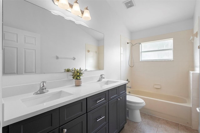 full bathroom featuring toilet, shower / washtub combination, double vanity, and tile patterned floors