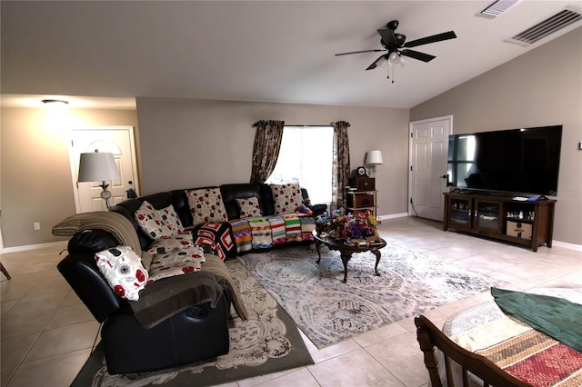 living area featuring tile patterned floors, ceiling fan, lofted ceiling, and baseboards