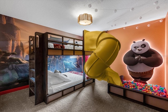 9020 Stinger Dr, Davenport, FL 33896 - carpeted bedroom featuring a textured ceiling