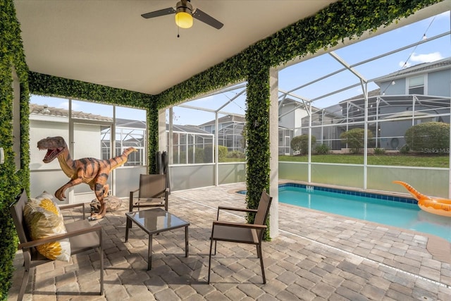9020 Stinger Dr, Davenport, FL 33896 - outdoor pool with a patio, ceiling fan, outdoor lounge area, and a lanai