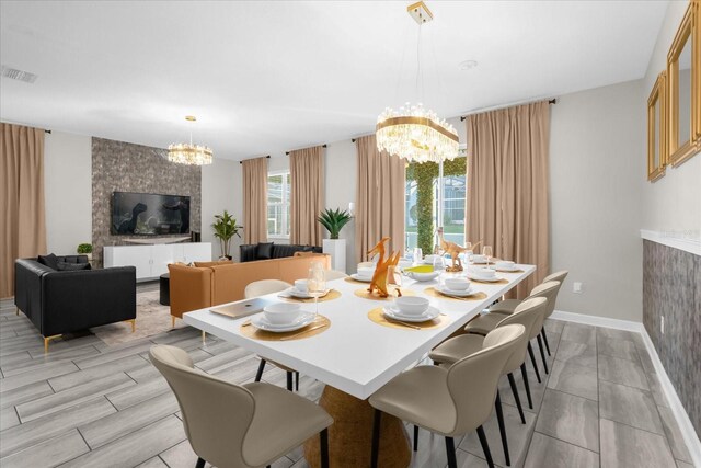 9020 Stinger Dr, Davenport, FL 33896 - dining area with a chandelier and baseboards