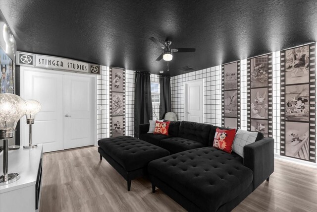 9020 Stinger Dr, Davenport, FL 33896 - living room featuring wood finished floors and a ceiling fan