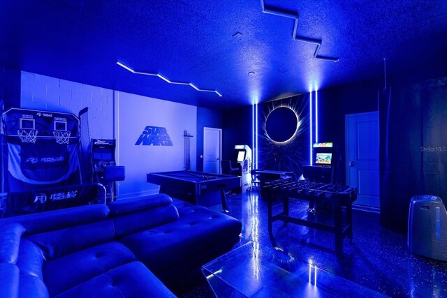 9020 Stinger Dr, Davenport, FL 33896 - bar area with pool table and a textured ceiling