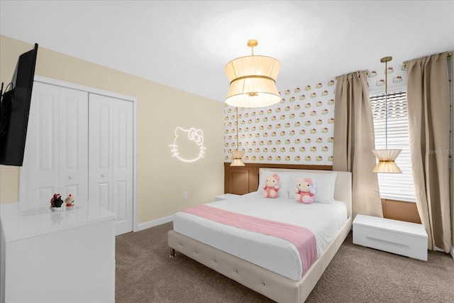 9020 Stinger Dr, Davenport, FL 33896 - bedroom with carpet, a closet, and baseboards
