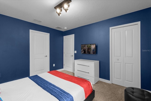 9020 Stinger Dr, Davenport, FL 33896 - bedroom with carpet flooring, baseboards, and a closet
