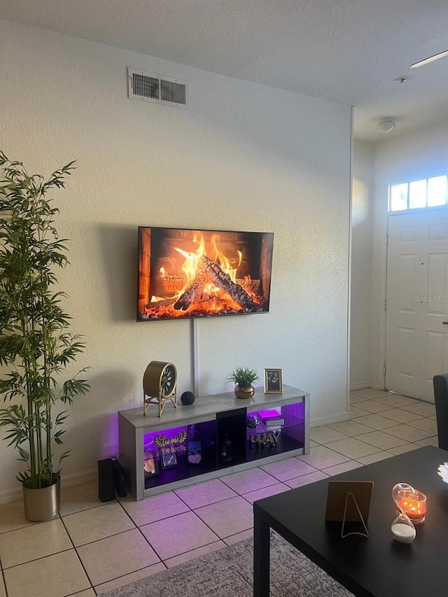 2203 San Vittorino Cir Unit 103, Kissimmee, FL 34741 - tiled living area with baseboards