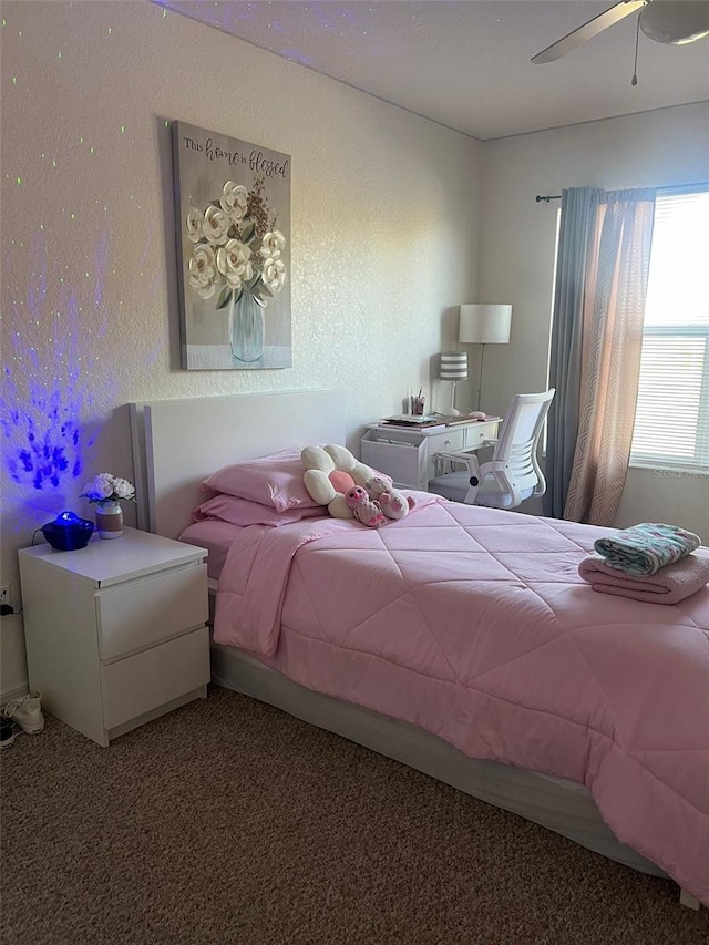 2203 San Vittorino Cir Unit 103, Kissimmee, FL 34741 - carpeted bedroom with a ceiling fan