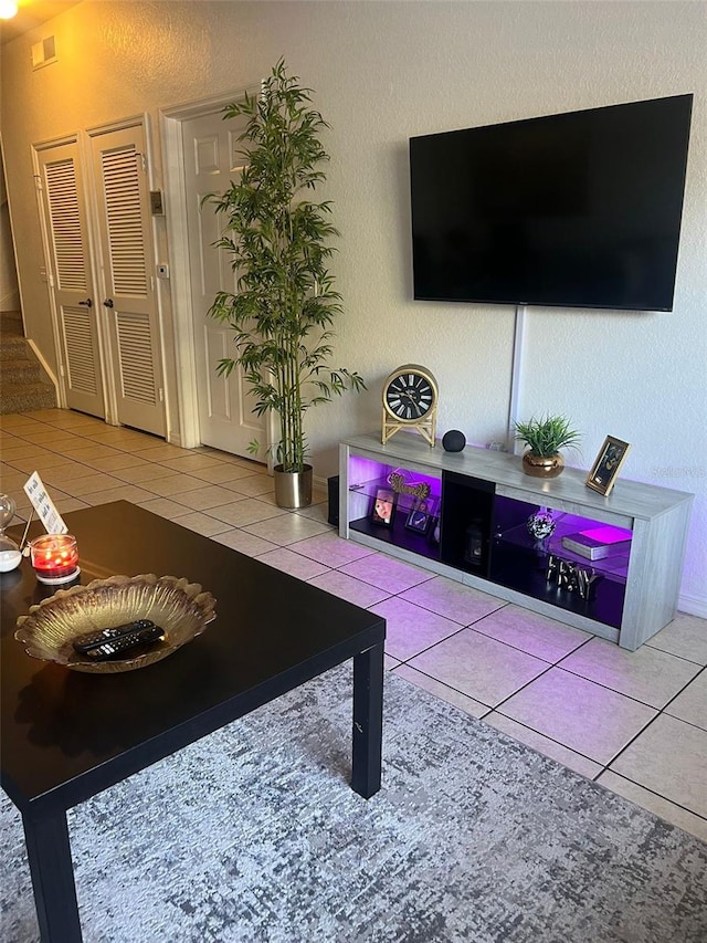2203 San Vittorino Cir Unit 103, Kissimmee, FL 34741 - living area with tile patterned floors