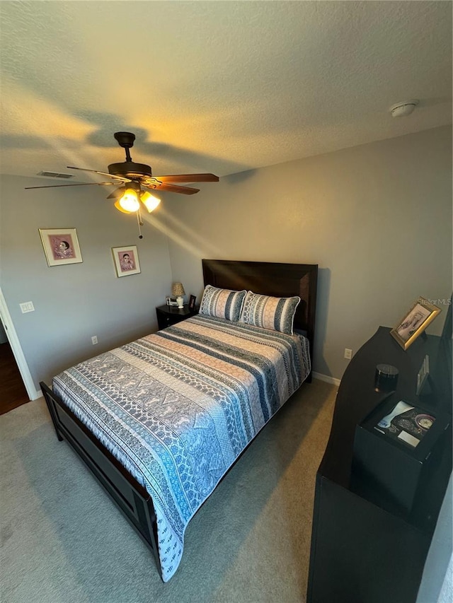 2289 Seven Oaks Dr, Saint Cloud, FL 34772 - bedroom with carpet floors, a textured ceiling, and ceiling fan