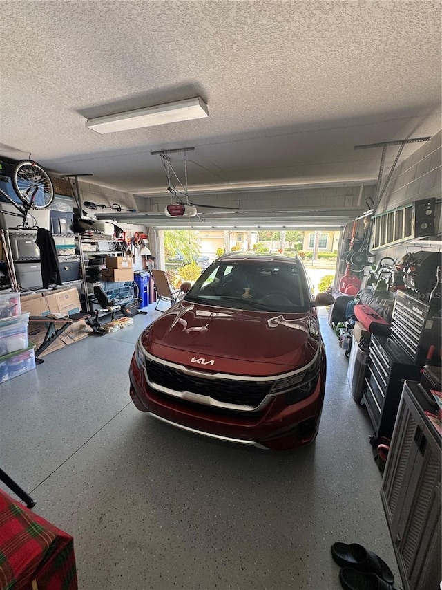 2289 Seven Oaks Dr, Saint Cloud, FL 34772 - garage featuring a garage door opener