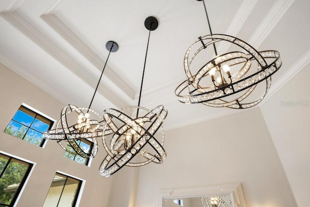 detailed view of a chandelier and crown molding