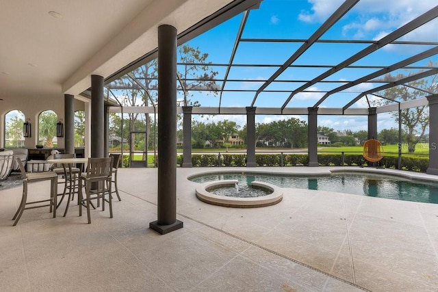 outdoor pool featuring a patio, a jacuzzi, and a lanai