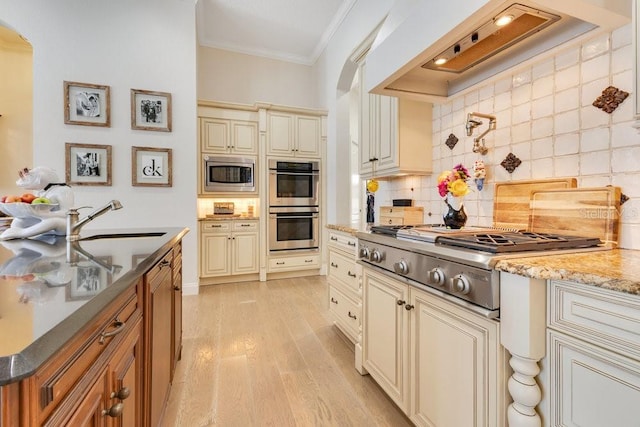 6761 Valhalla Way, Windermere, FL 34786 - kitchen featuring cream cabinetry, stainless steel appliances, custom exhaust hood, crown molding, and light wood-style flooring