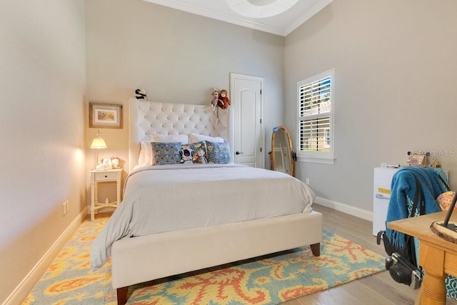 6761 Valhalla Way, Windermere, FL 34786 - bedroom with crown molding, light wood finished floors, and a high ceiling
